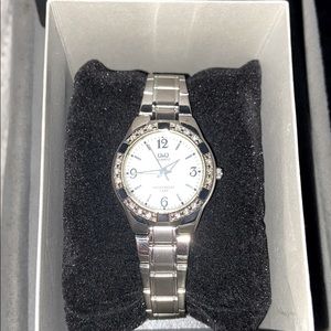 Q and Q Women’s Watch Crystal Bezel Silver